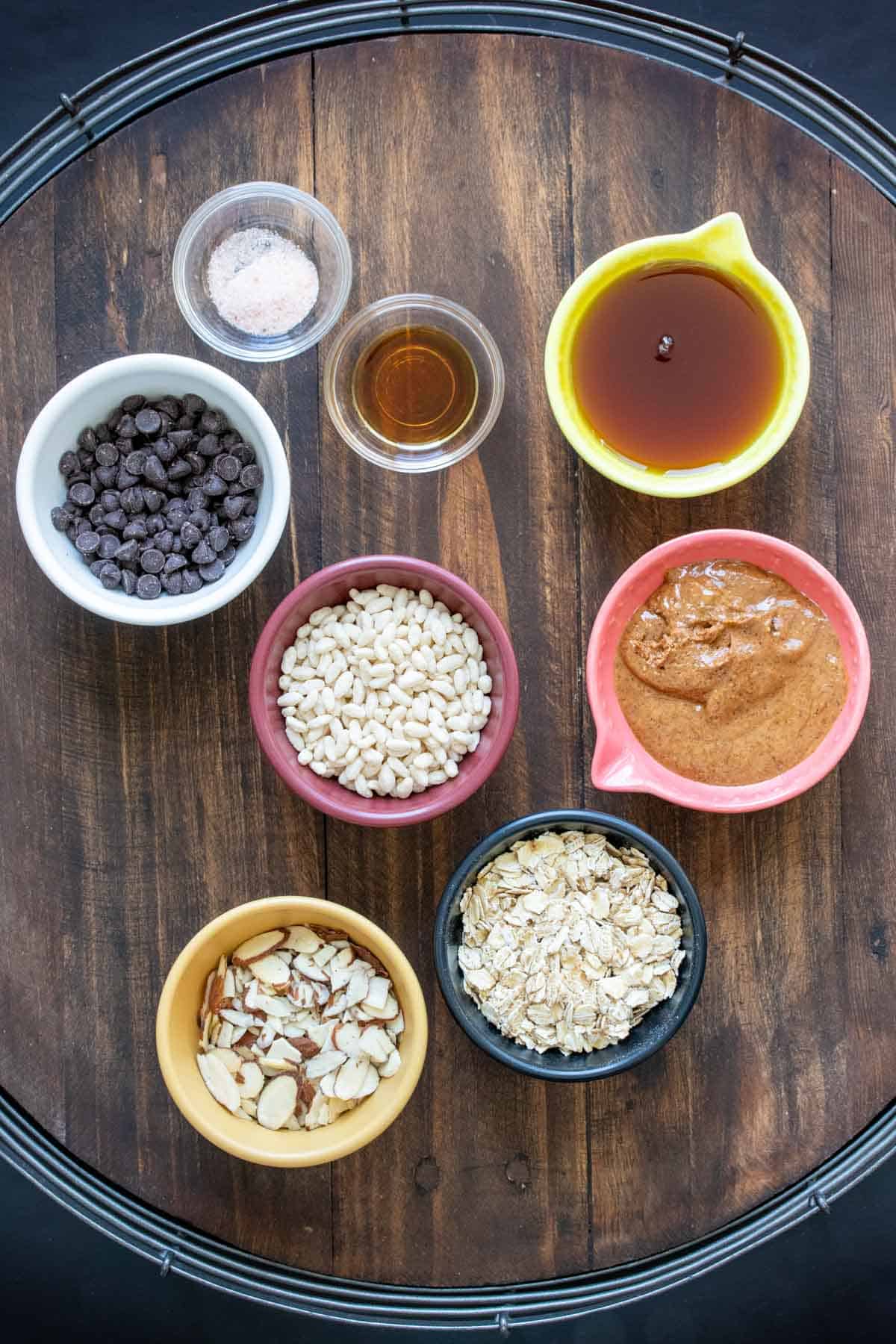 Bowls with ingredients needed to make homemade granola bars