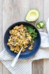 Overlay text on Mexican street corn salad with a photo of the final recipe in a bowl.