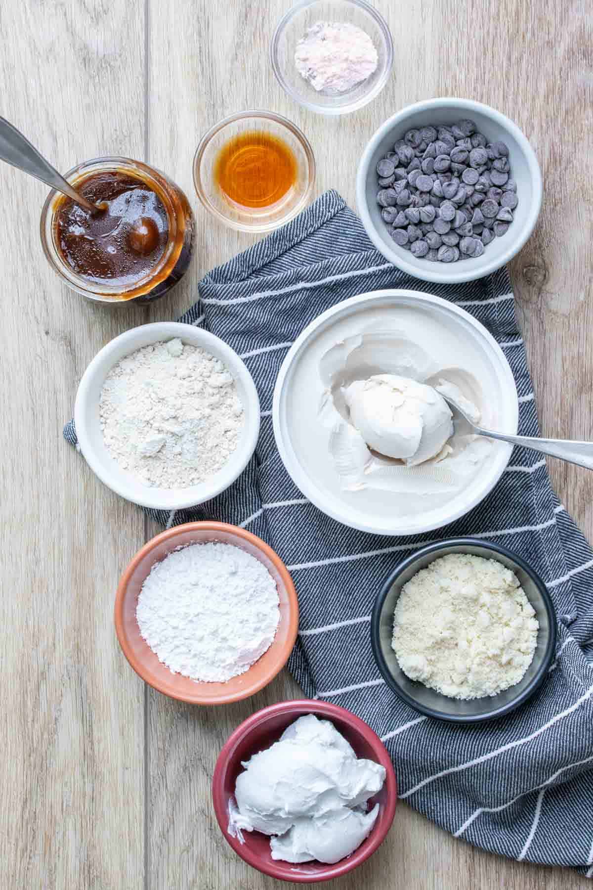 Ingredients needed to make a dessert with shortbread, caramel and chocolate ganache
