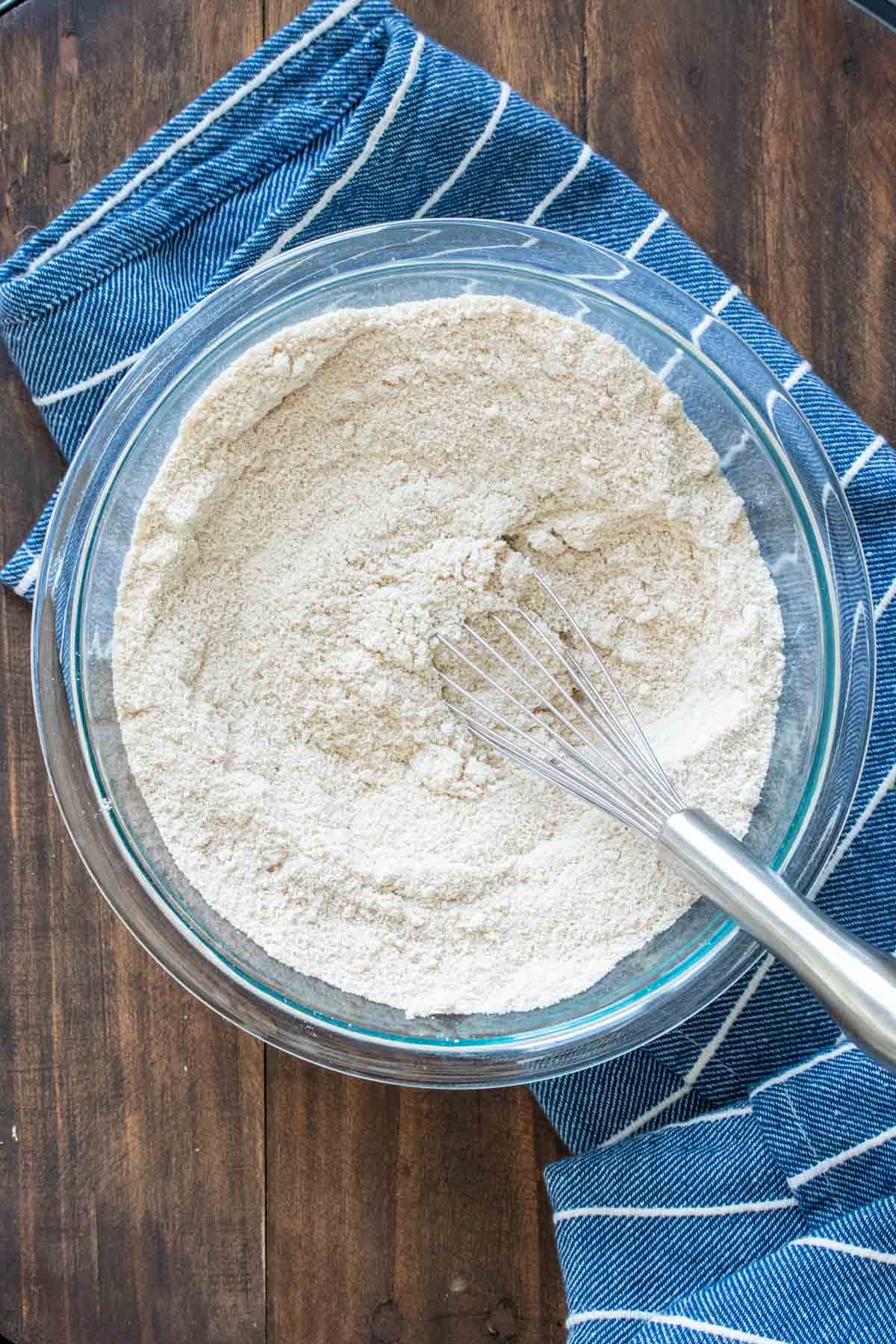 Top view of flours mixed in a glass bowl