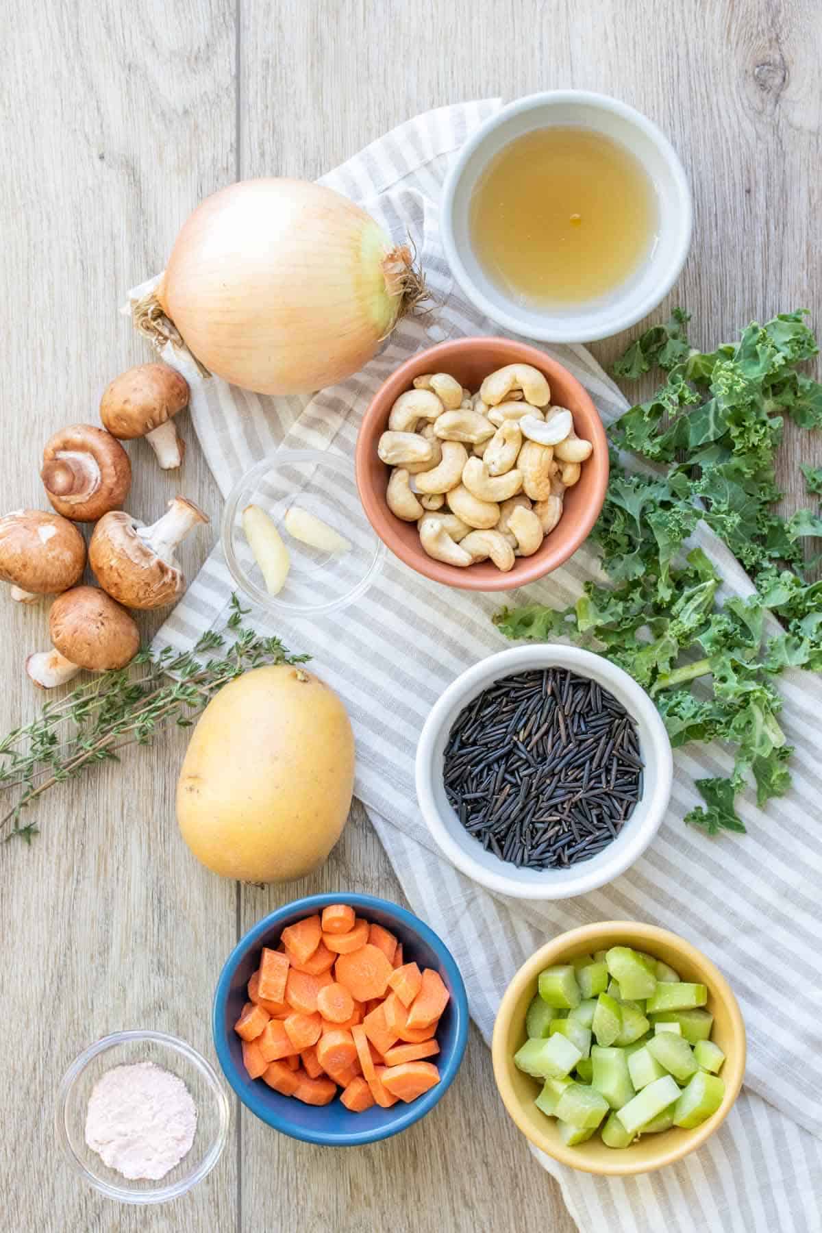 Ingredients needed to make a veggie wild rice soup dairy free with cashews.